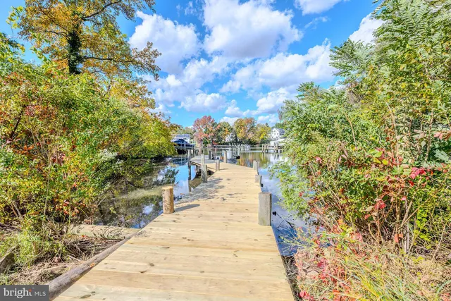 a view of a lake with a house