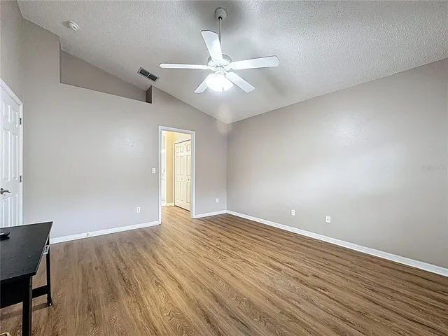 a bathroom with a sink a mirror and shower