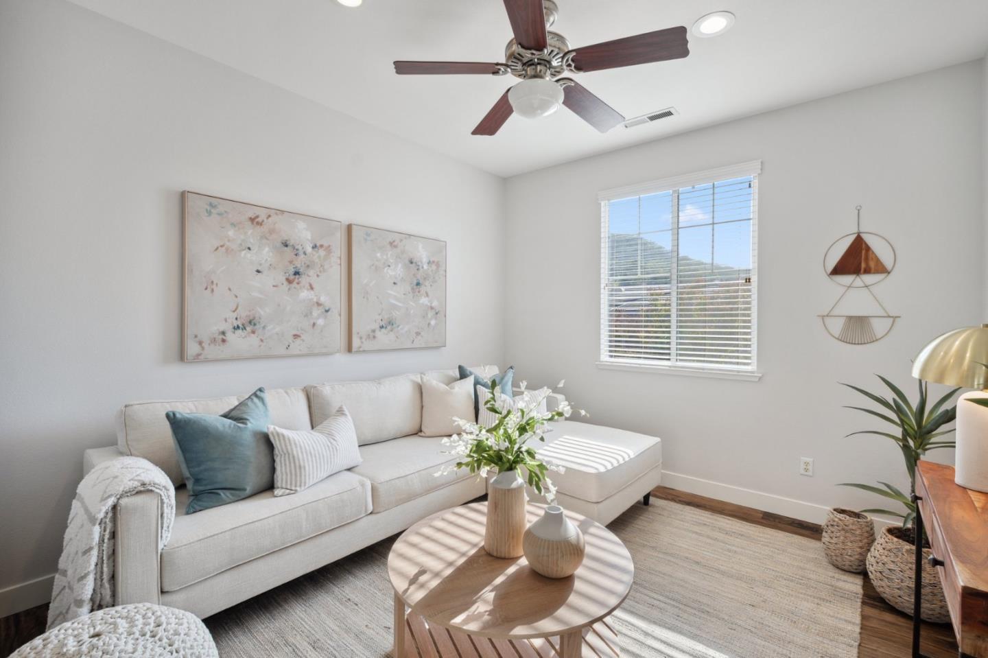 7531 Edinburgh Way Gilroy, CA 95020 - Photo 23 of 52 a living room with furniture and wooden floor