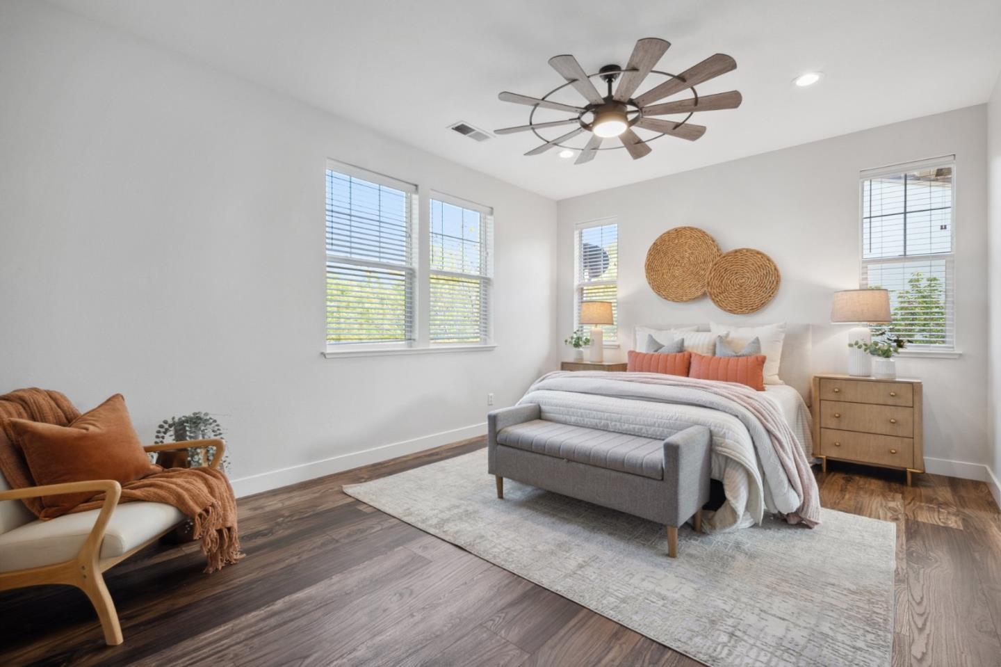 7531 Edinburgh Way Gilroy, CA 95020 - Photo 26 of 52 a bedroom with a bed and wooden floor
