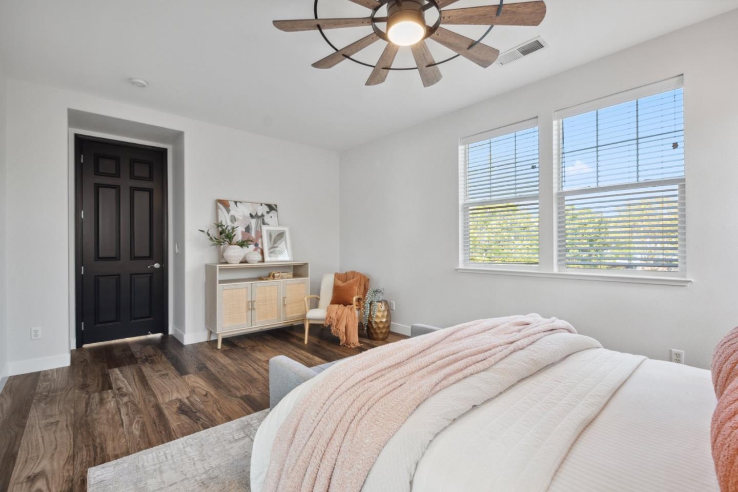 7531 Edinburgh Way Gilroy, CA 95020 - Photo 27 of 52 a bedroom with a bed and a chandelier