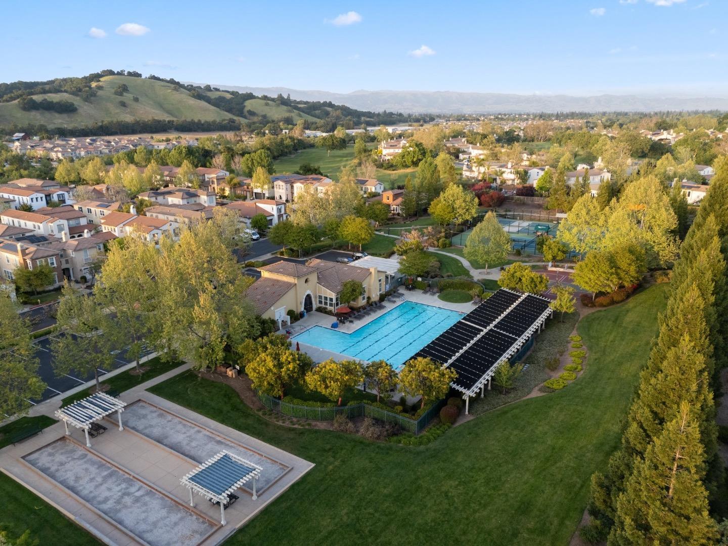 7531 Edinburgh Way Gilroy, CA 95020 - Photo 47 of 52 an aerial view of residential houses with outdoor space and lake view