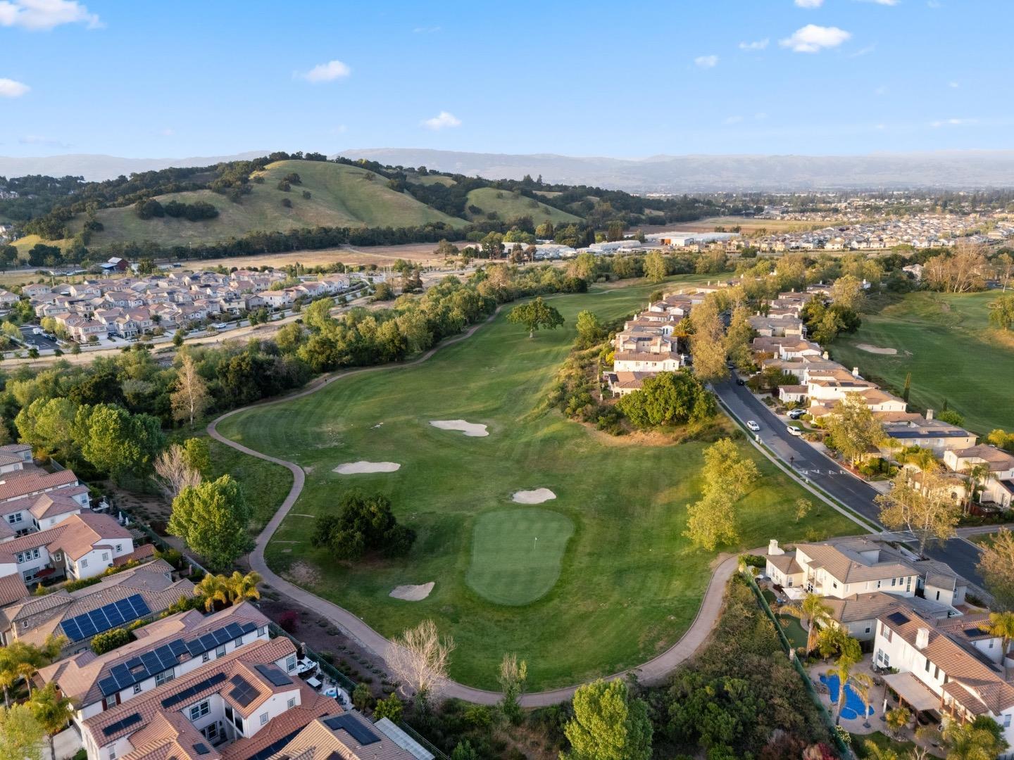 7531 Edinburgh Way Gilroy, CA 95020 - Photo 48 of 52 an aerial view of a residential houses with outdoor space and river