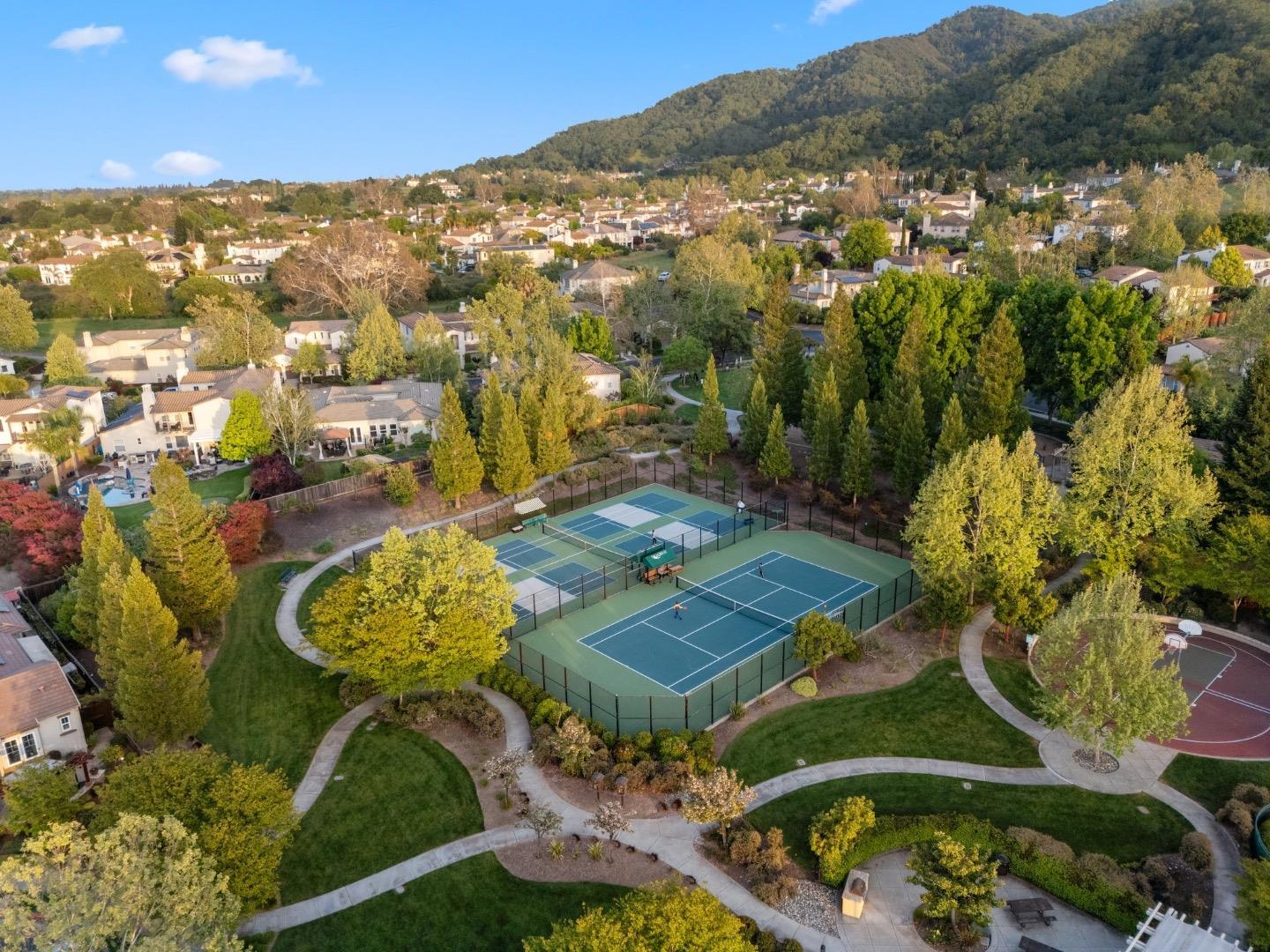 7531 Edinburgh Way Gilroy, CA 95020 - Photo 49 of 52 an aerial view of a residential houses with outdoor space and trees