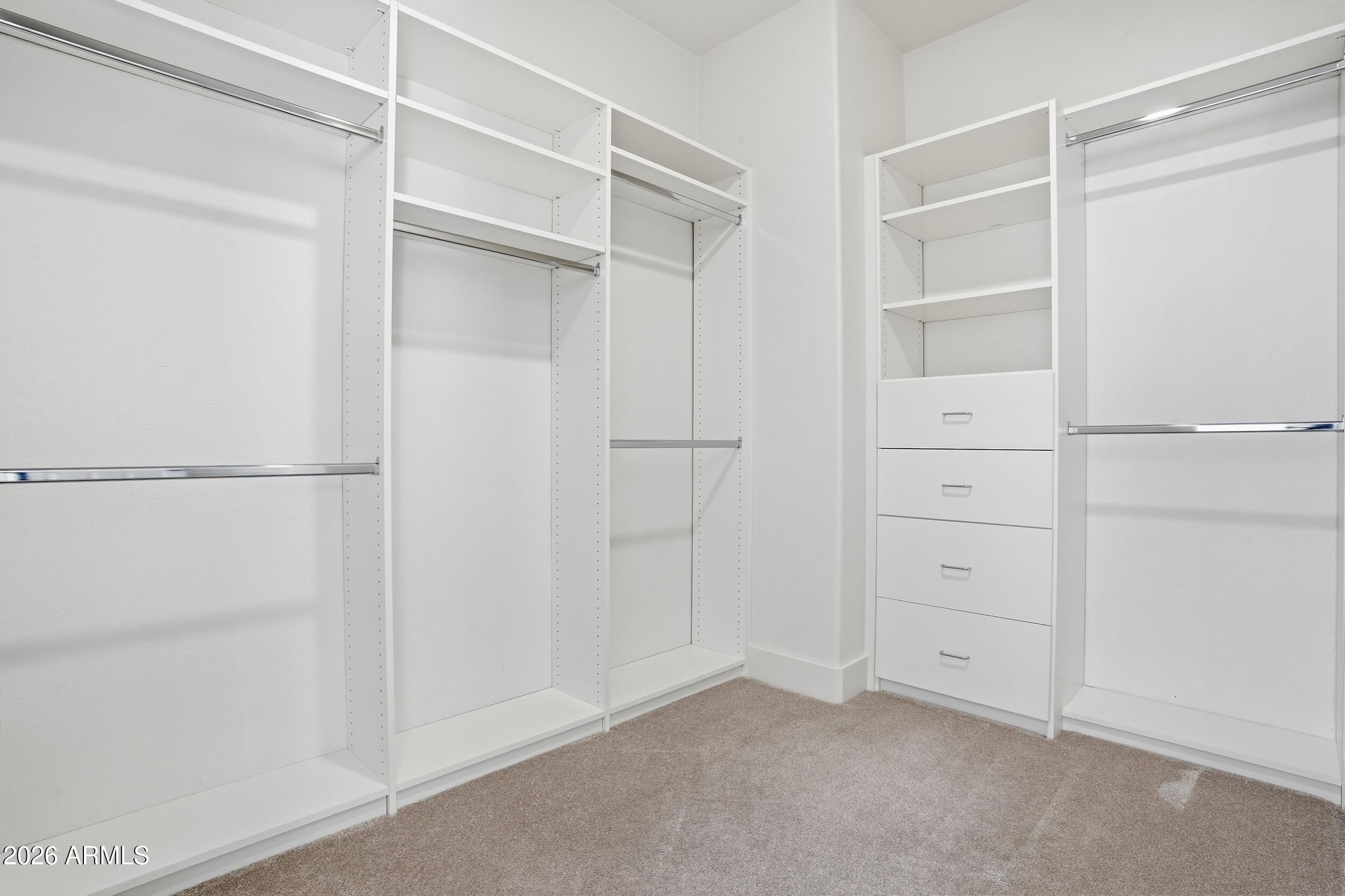 3262 East Cotton Lane Gilbert, AZ 85234 - Photo 26 of 53 a view of an empty walk in closet