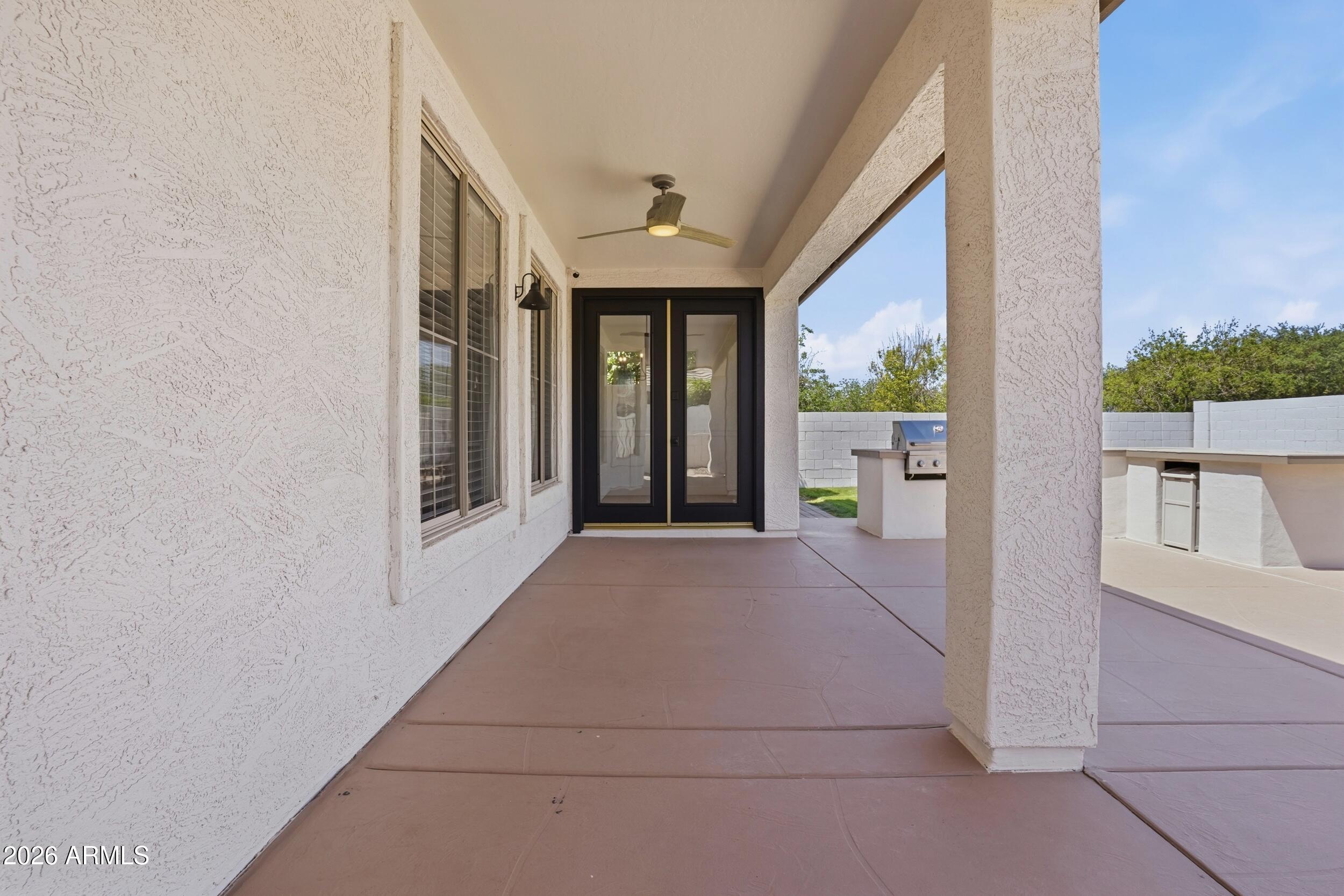 3262 East Cotton Lane Gilbert, AZ 85234 - Photo 40 of 53 wooden floor in an empty room with a window