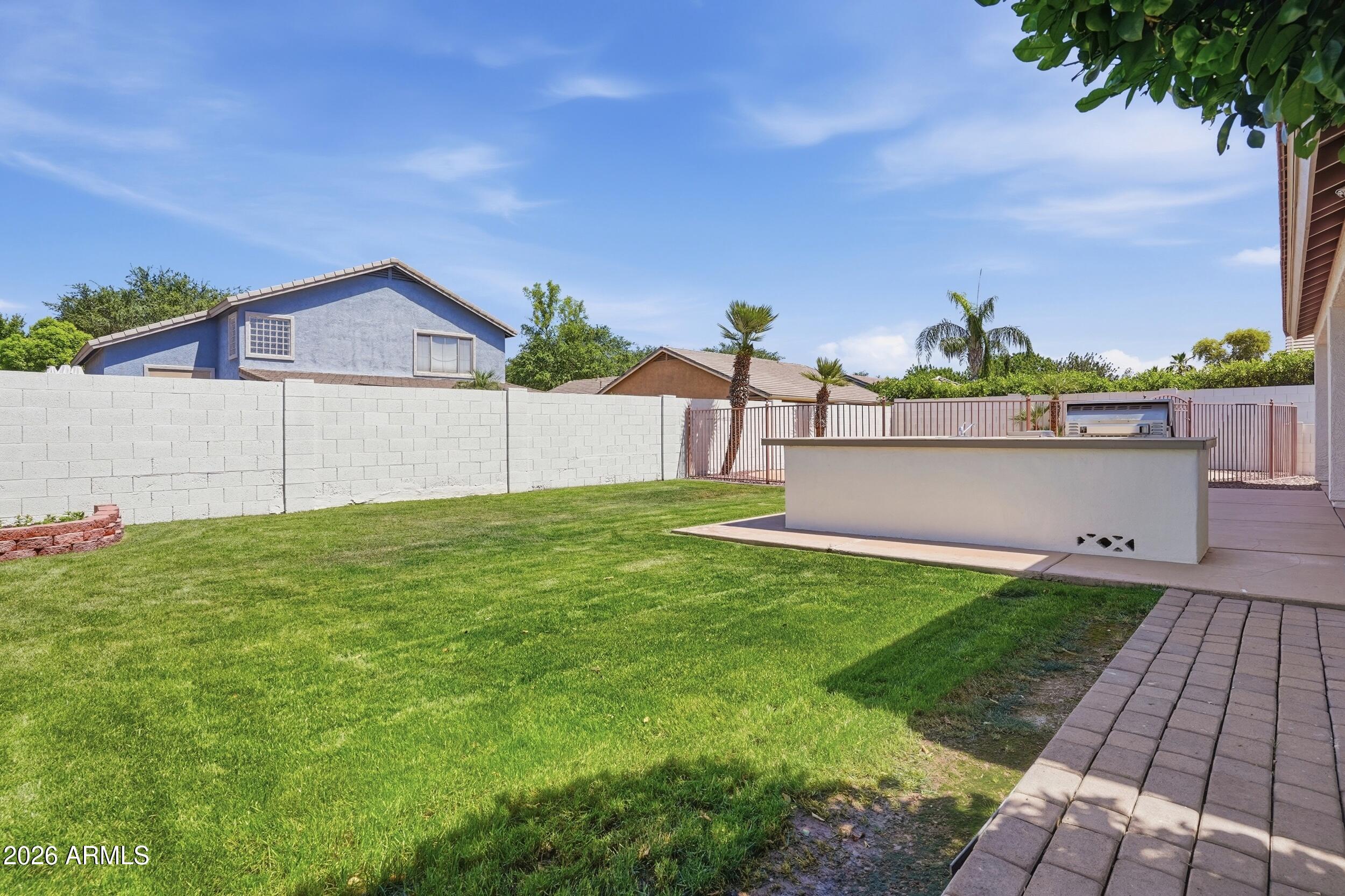 3262 East Cotton Lane Gilbert, AZ 85234 - Photo 43 of 53 a view of a backyard