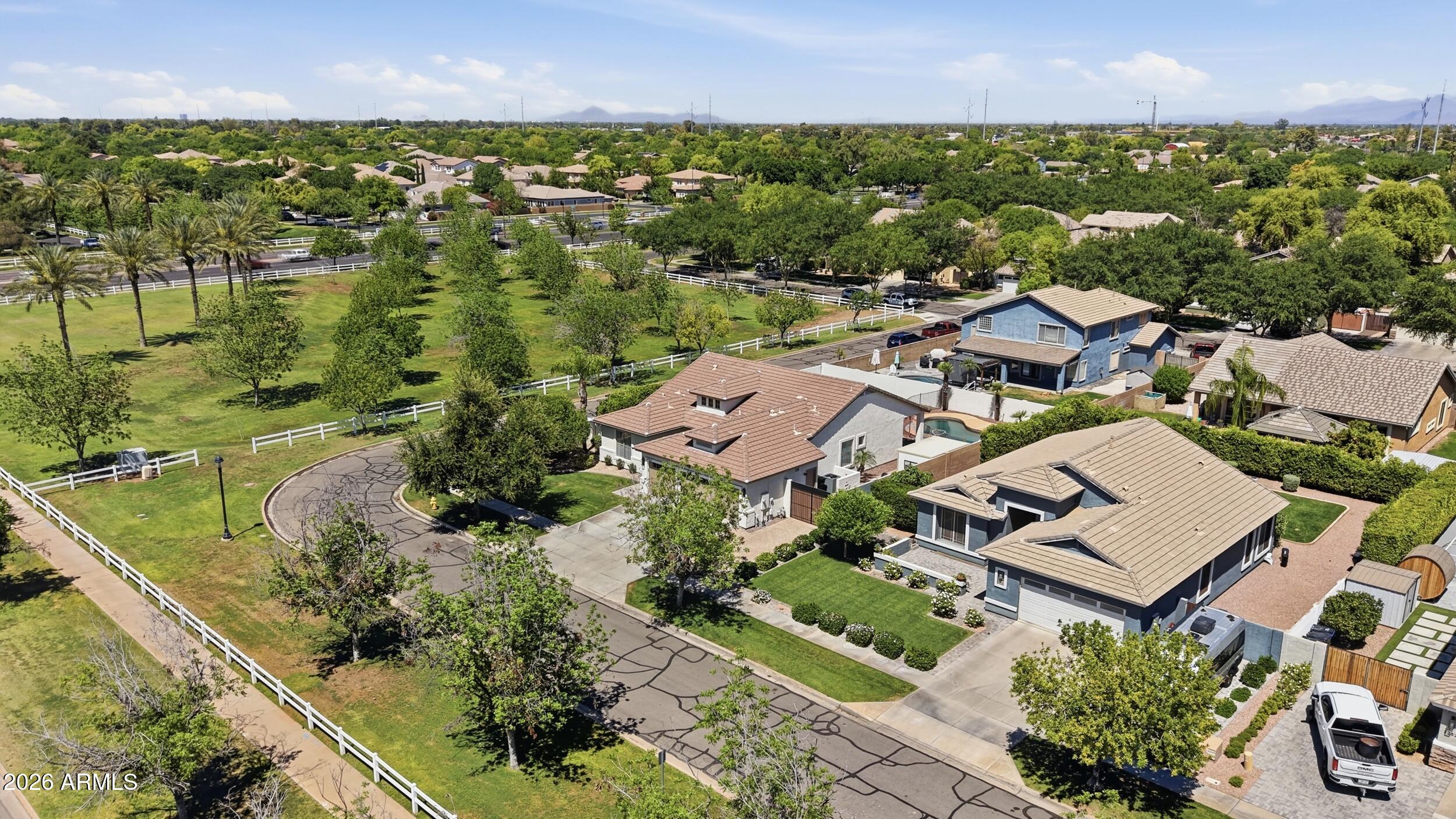3262 East Cotton Lane Gilbert, AZ 85234 - Photo 48 of 53 an aerial view of residential houses with outdoor space