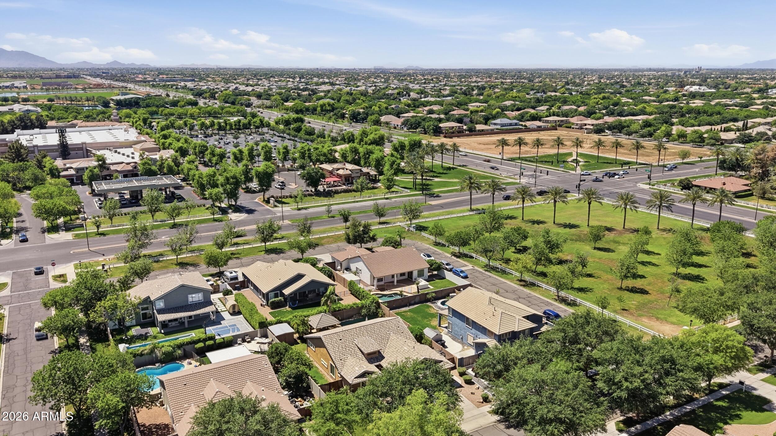 3262 East Cotton Lane Gilbert, AZ 85234 - Photo 51 of 53 an aerial view of residential houses with outdoor space