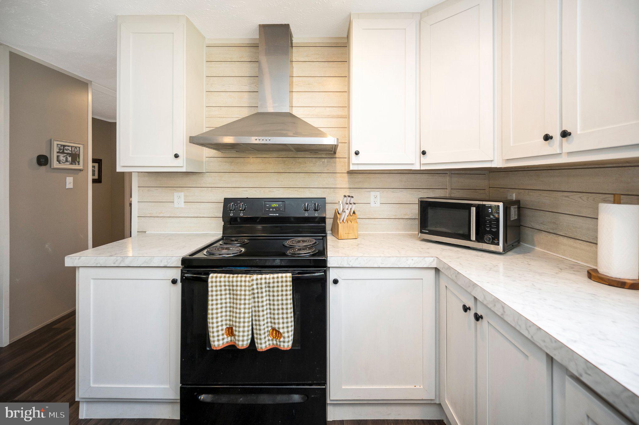 5120 Burr Hill Road Rhoadesville, VA 22542 - Photo 14 of 45 Modern kitchen with sleek finishes.