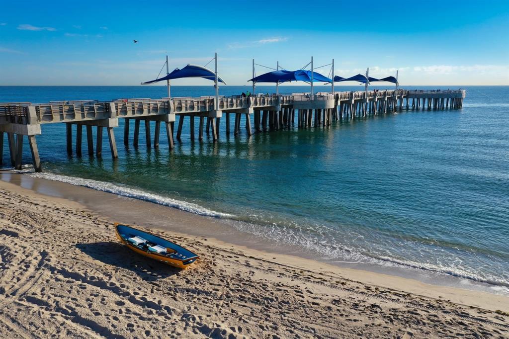 1401 North Riverside Drive, Unit 705 Pompano Beach, FL 33062 - Photo 28 of 30 a view of a swimming pool with a chairs