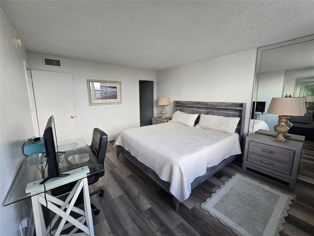 1401 North Riverside Drive, Unit 705 Pompano Beach, FL 33062 - Photo 7 of 30 a bedroom with a bed and furniture