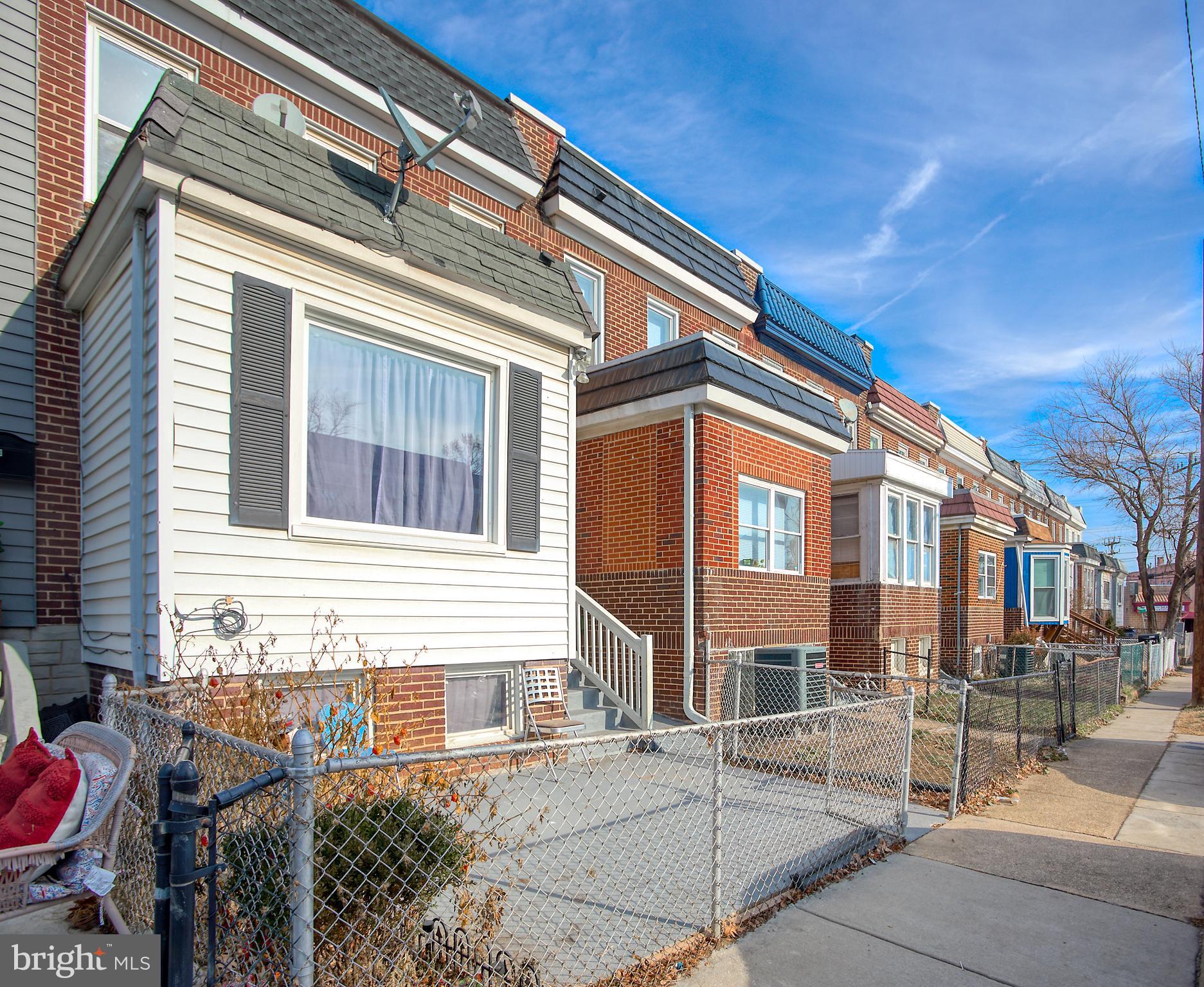 1332 Cambria Street Baltimore, MD 21225 - Photo 2 of 31 a view of a house with a patio