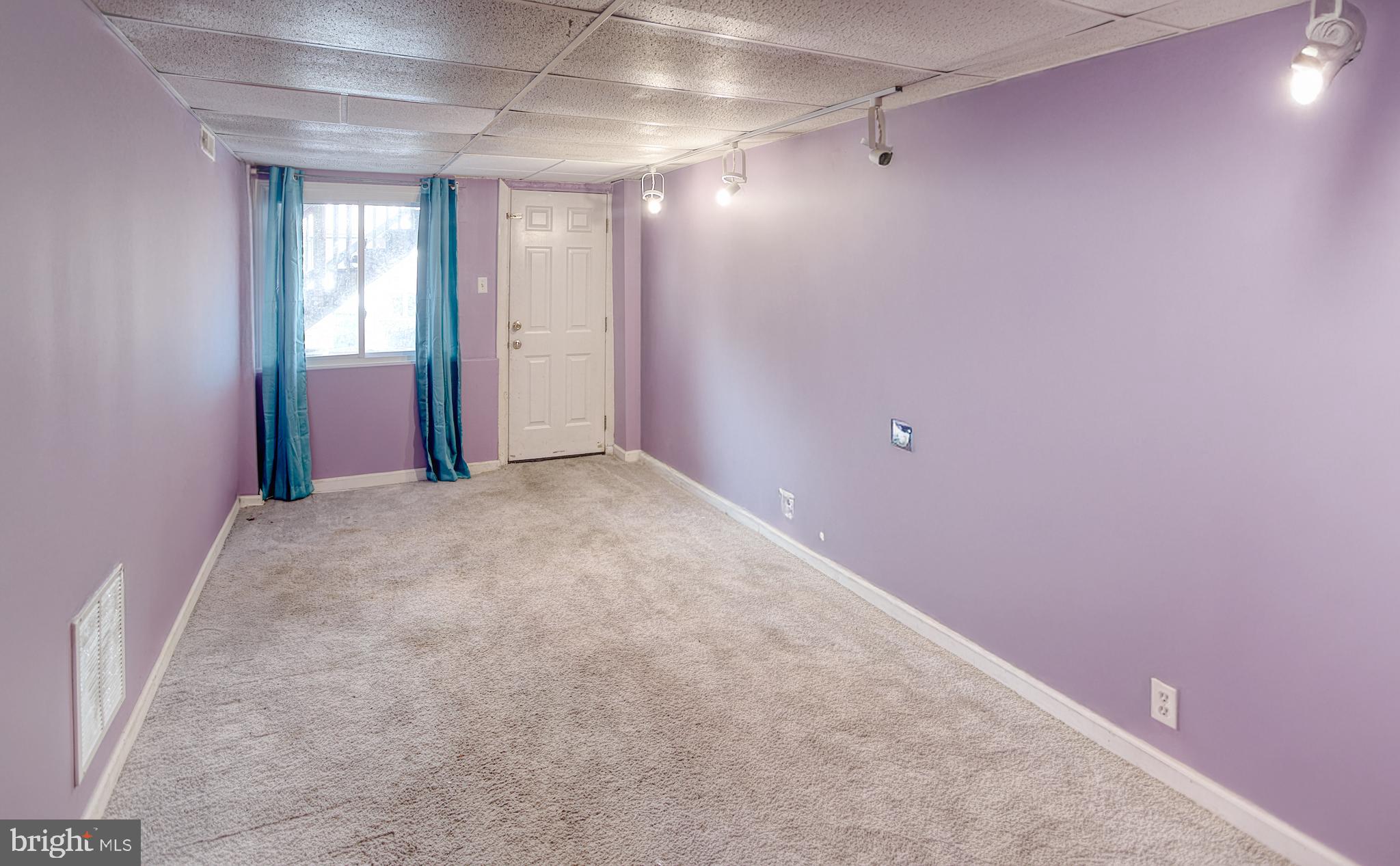 1332 Cambria Street Baltimore, MD 21225 - Photo 28 of 31 a view of a hallway with closet