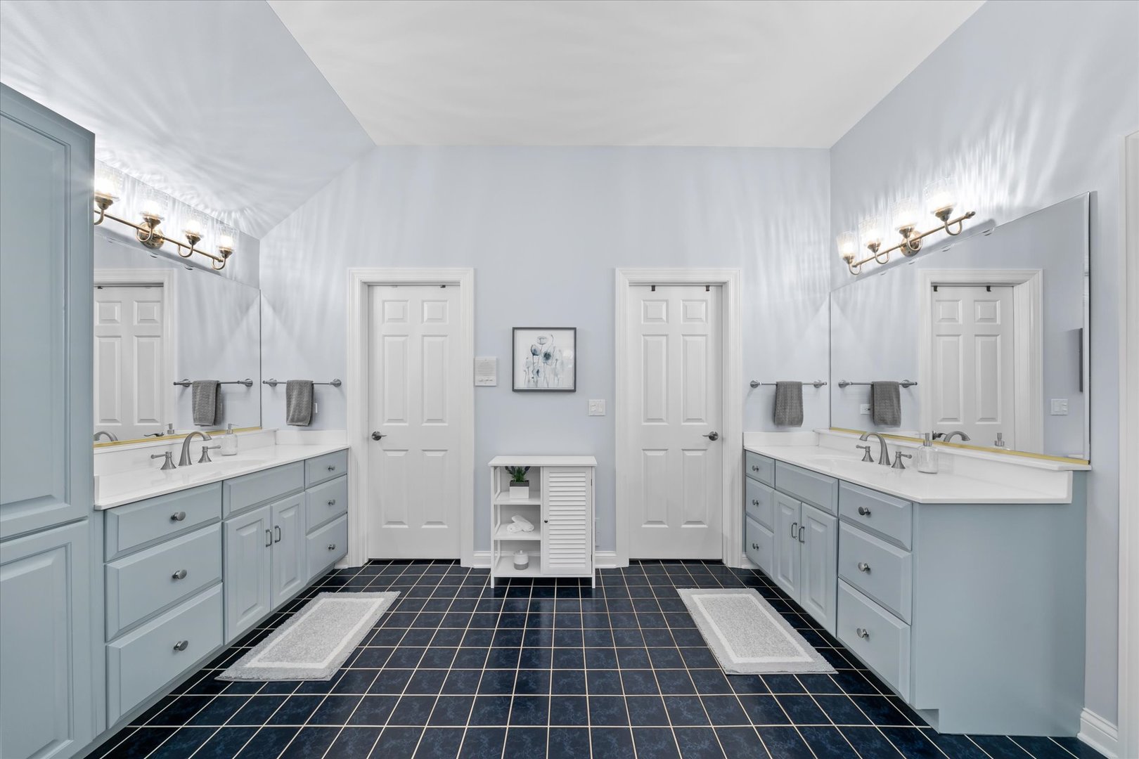 36W708 Stoneleat Road St. Charles, IL 60175 - Photo 14 of 31 a spacious bathroom with a double vanity sink a mirror and a shower