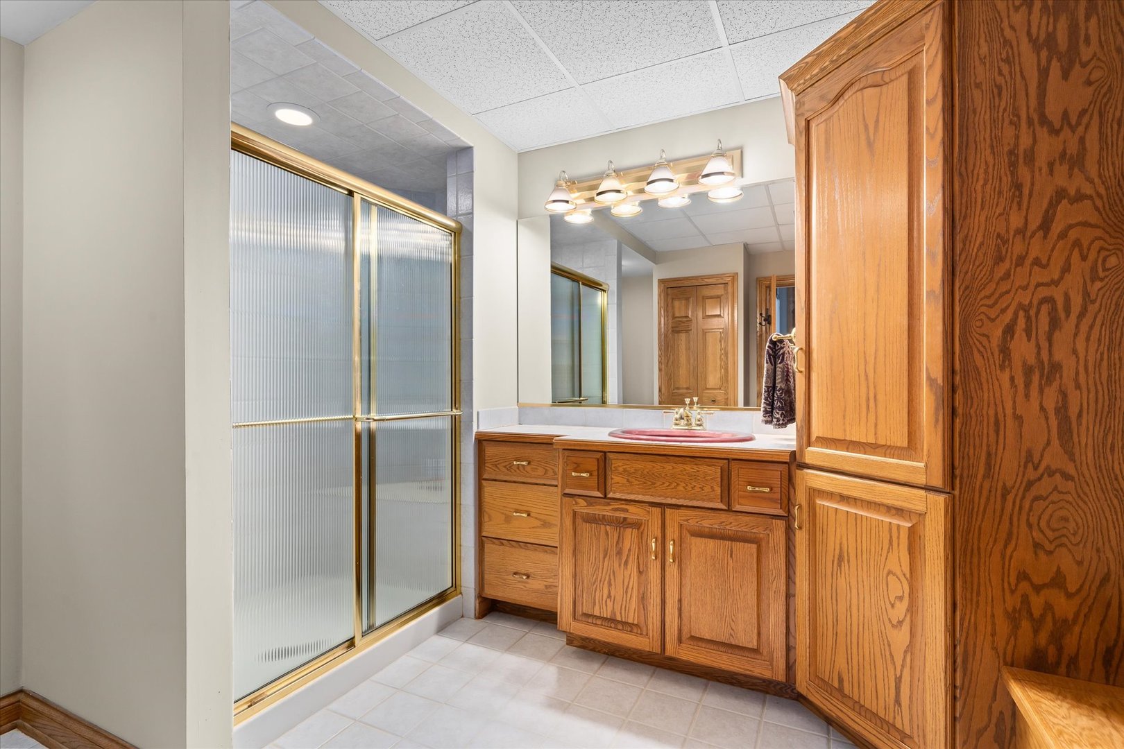 36W708 Stoneleat Road St. Charles, IL 60175 - Photo 22 of 31 a bathroom with a double vanity sink and mirror