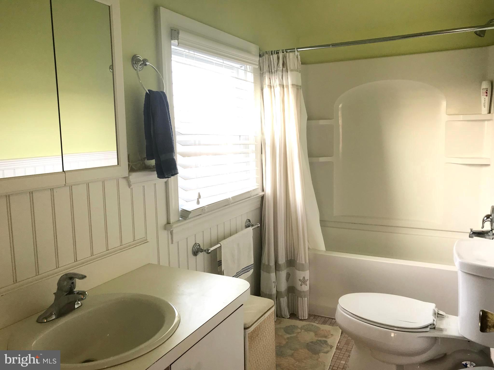 4416 Whalerman Road Brigantine, NJ 08203 - Photo 14 of 22 a bathroom with a sink and a toilet