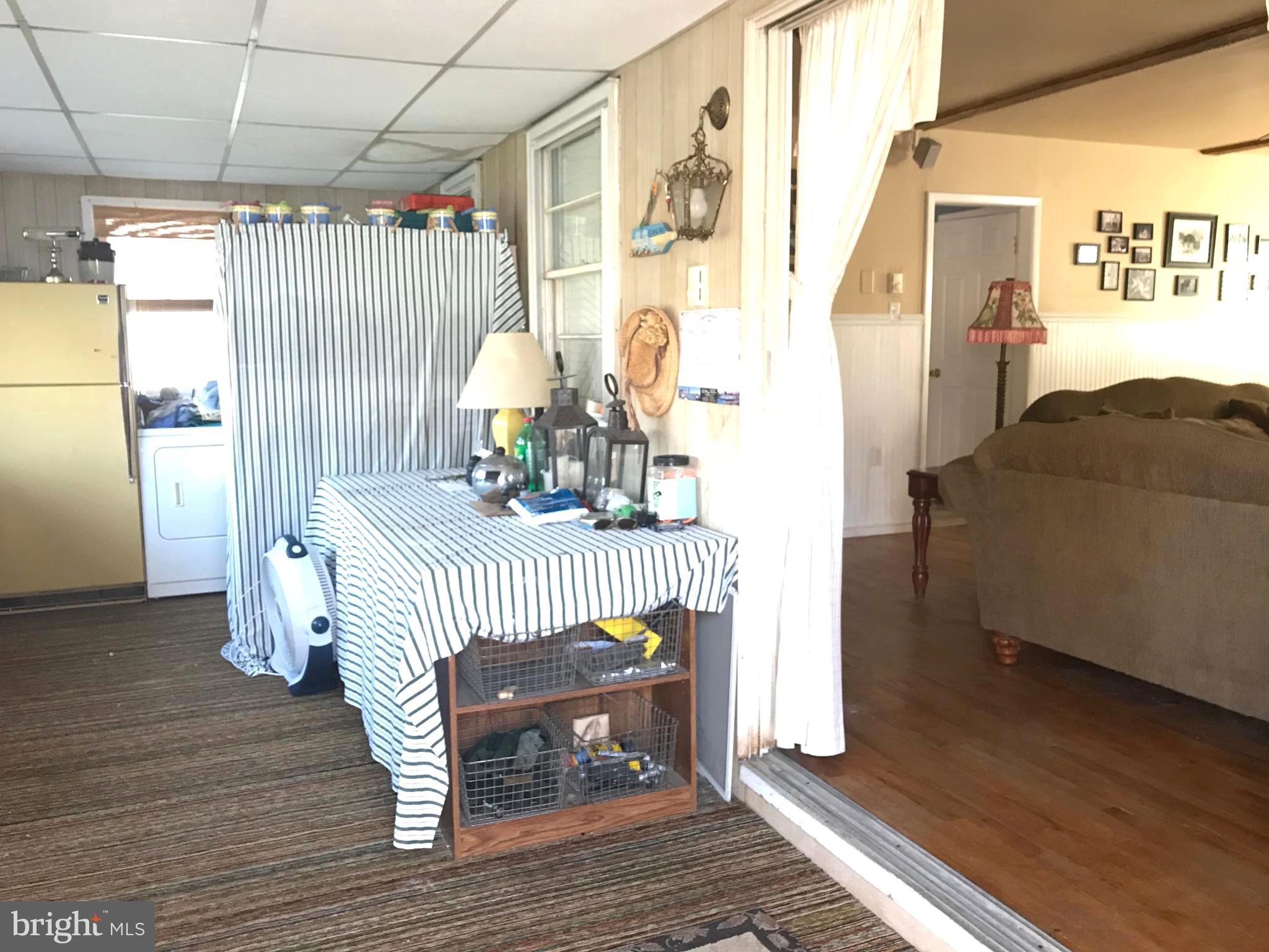 4416 Whalerman Road Brigantine, NJ 08203 - Photo 18 of 22 a bedroom with a bed and a window