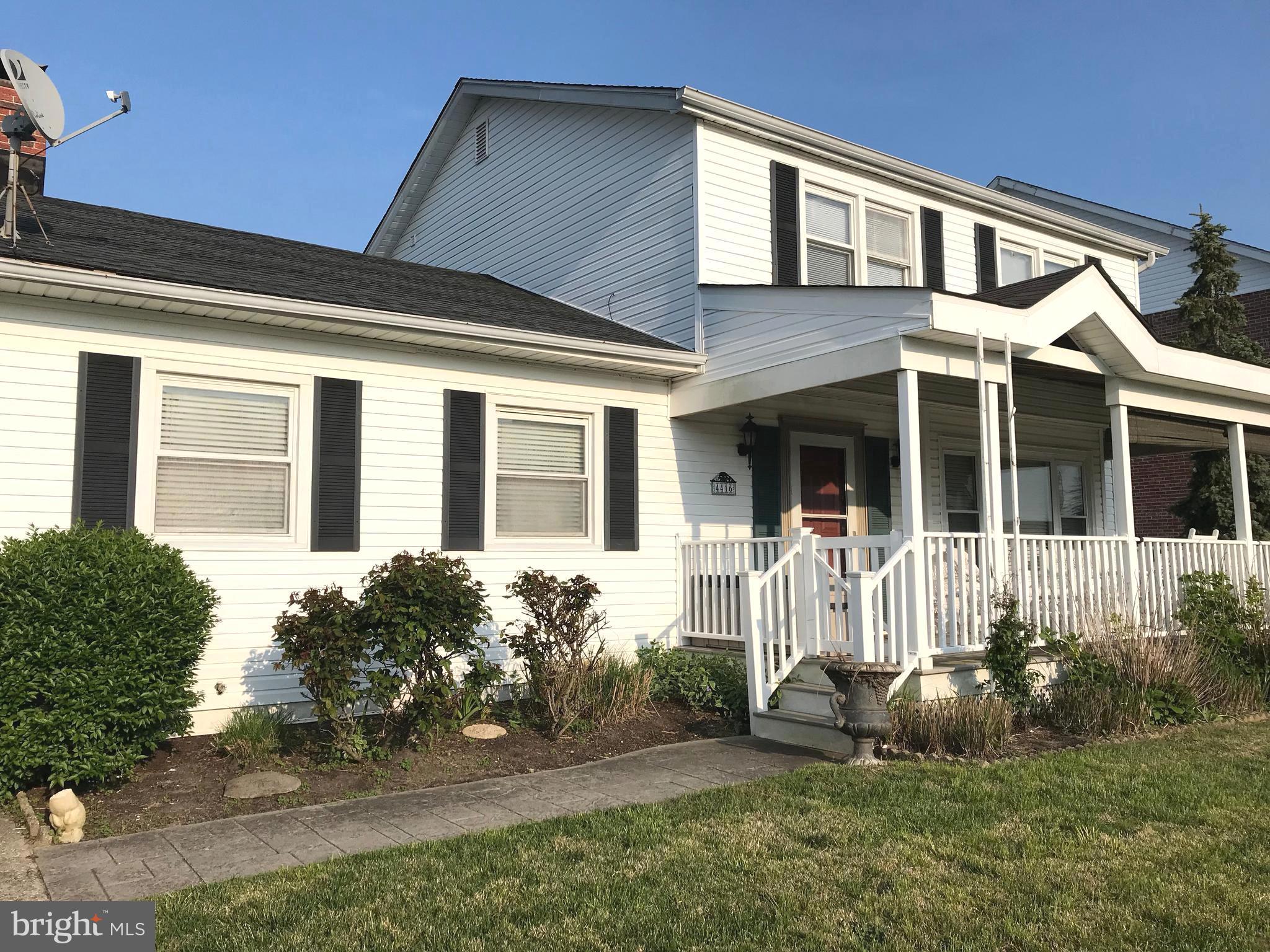 4416 Whalerman Road Brigantine, NJ 08203 - Photo 3 of 22 a front view of a house with a yard