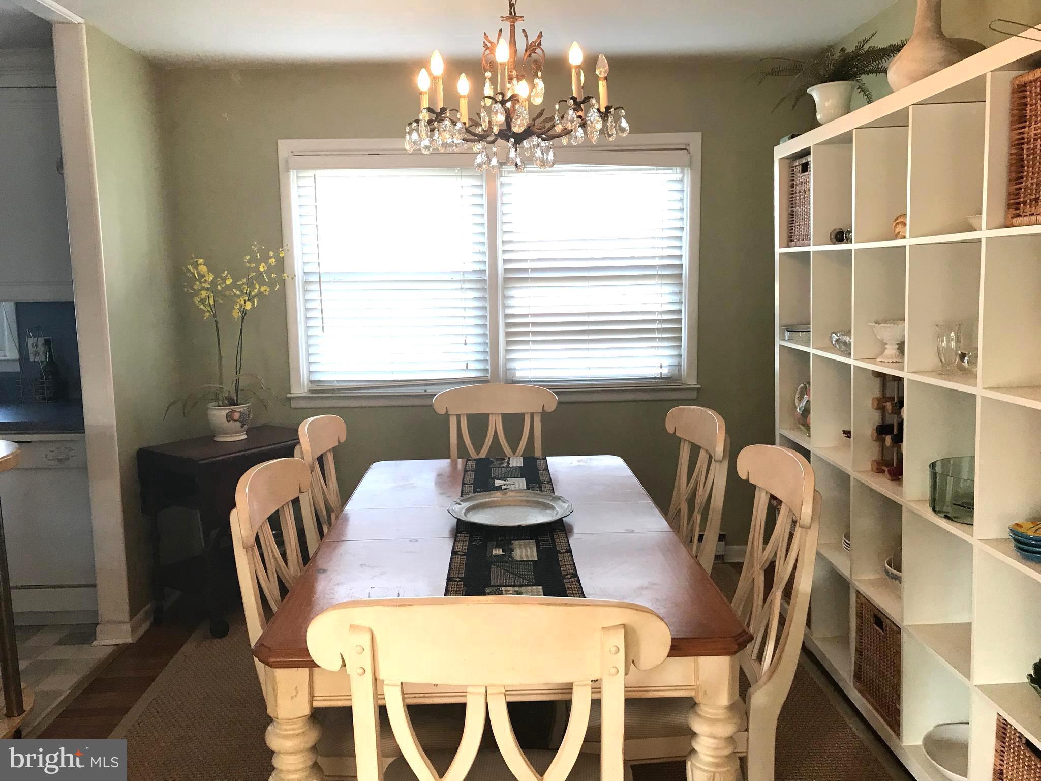 4416 Whalerman Road Brigantine, NJ 08203 - Photo 7 of 22 a view of a dining room with furniture window and outside view