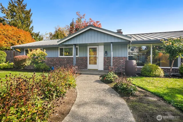 front view of a house with a yard