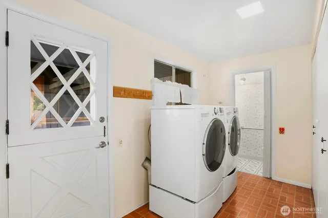 a utility room with dryer and washer