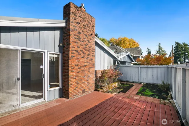 a balcony view with a seating space