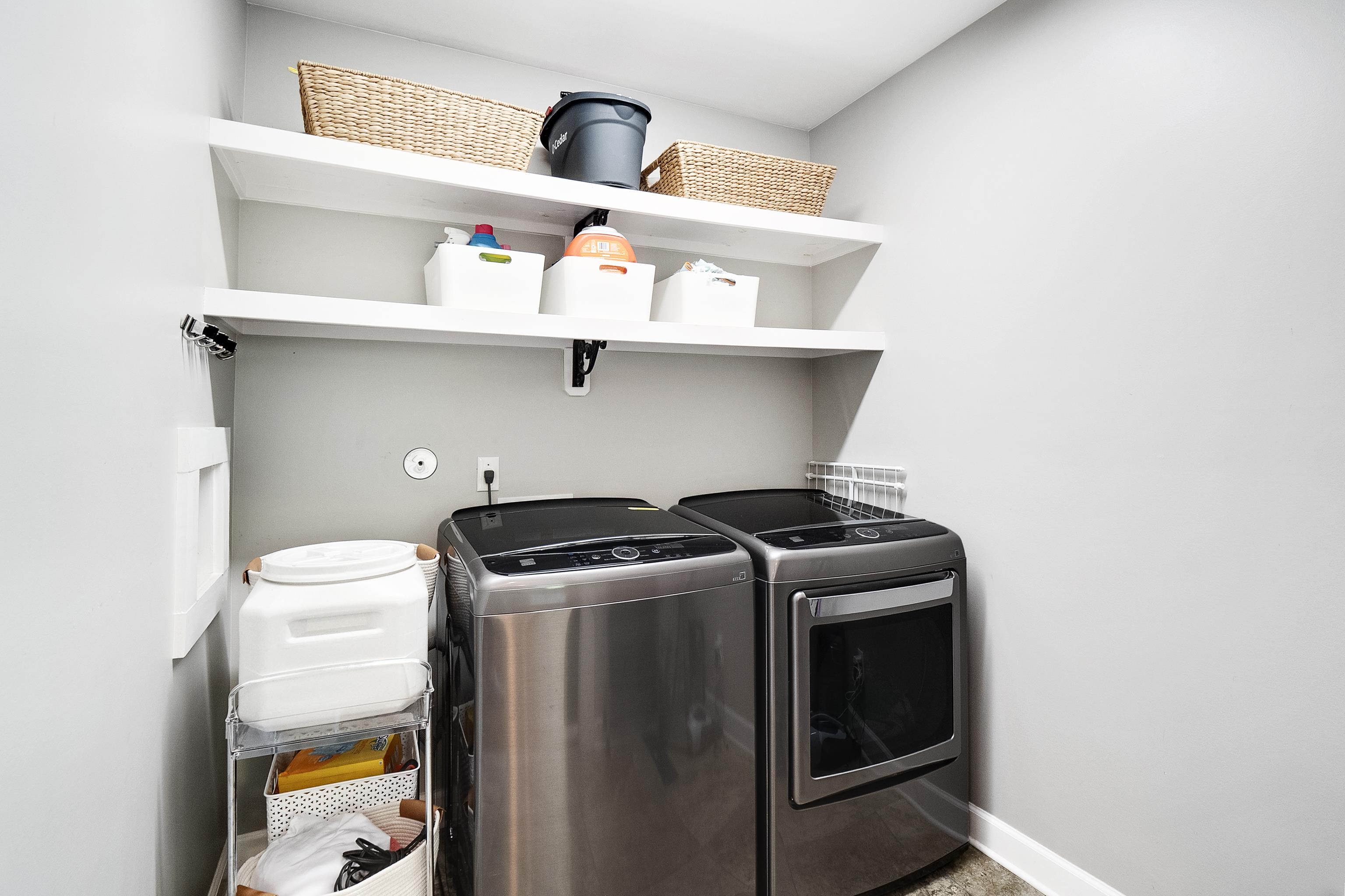 168 Avon Road Memphis, TN 38117 - Photo 31 of 38 a utility room with dryer and washer