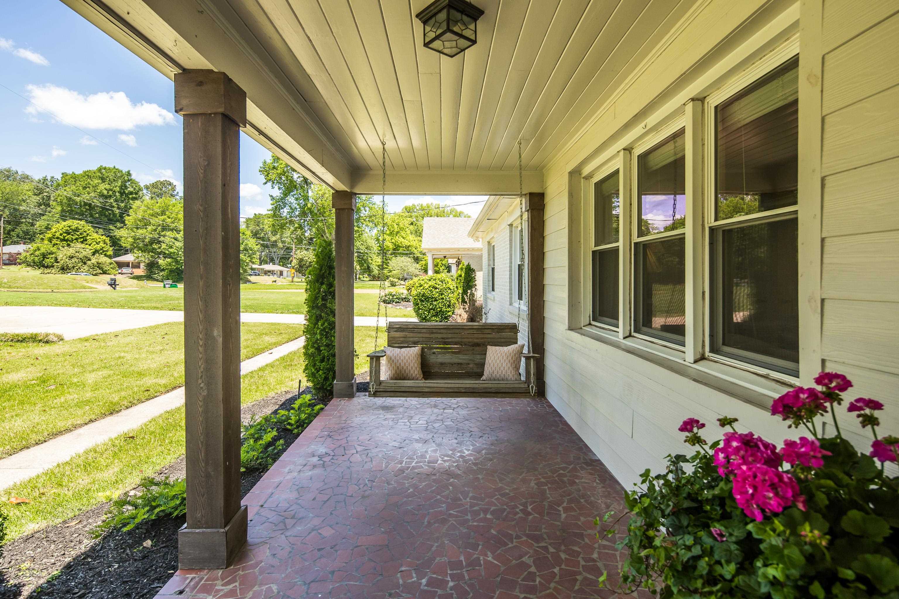 168 Avon Road Memphis, TN 38117 - Photo 4 of 38 a view of a porch with furniture