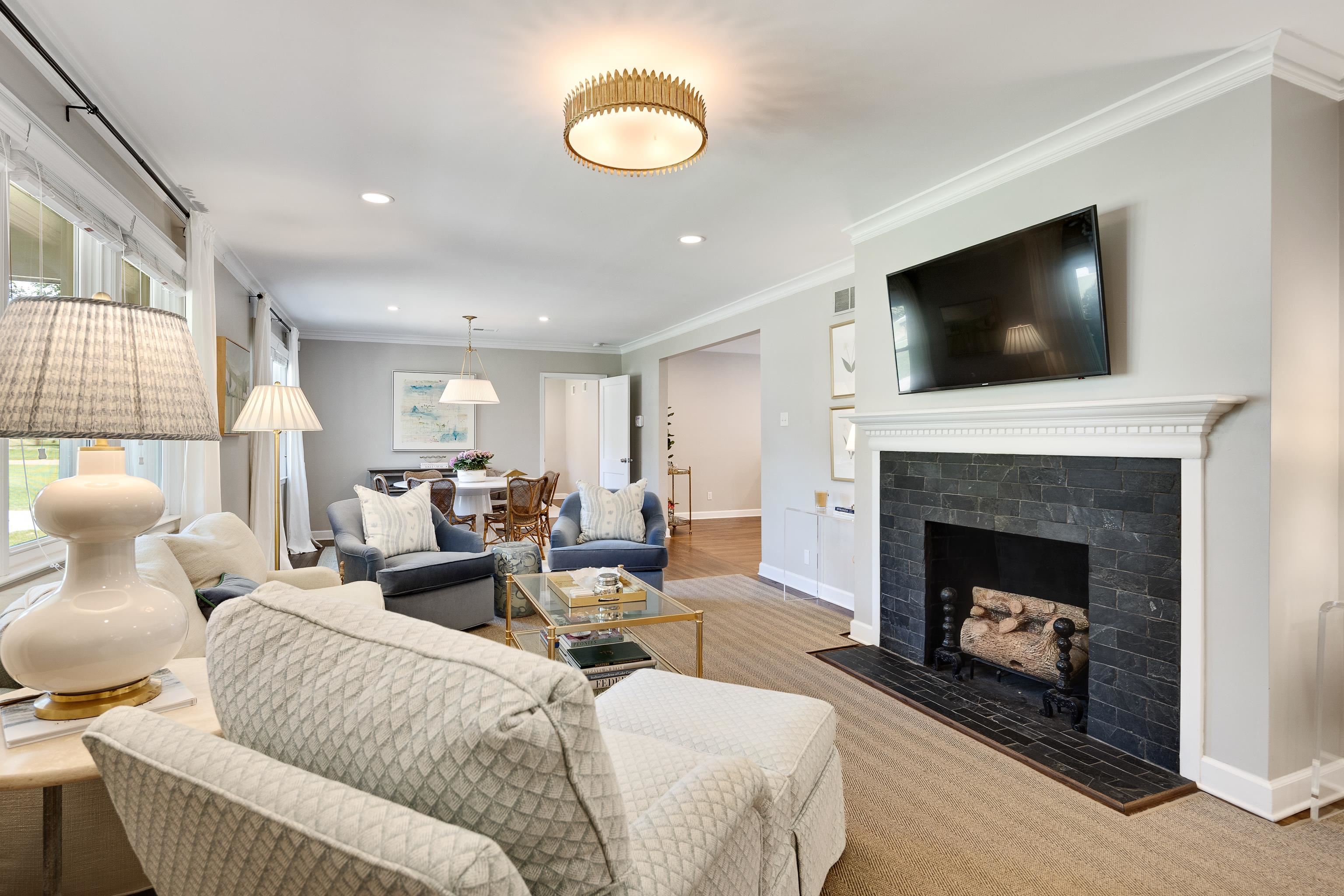 168 Avon Road Memphis, TN 38117 - Photo 8 of 38 a living room with furniture and a fireplace