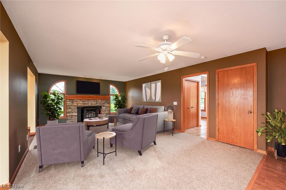 2449 Hartville Road Mogadore, OH 44260 - Photo 19 of 35 Family Room with pellet stove virtually staged.