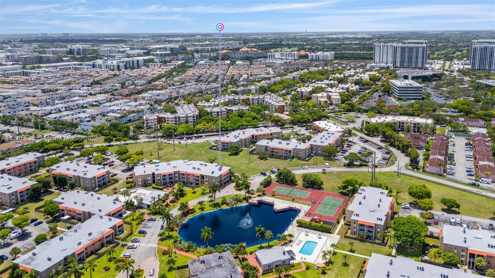 4920 Northwest 79th Avenue, Unit 309 Doral, FL 33166 - Photo 26 of 33 an aerial view of residential houses with outdoor space