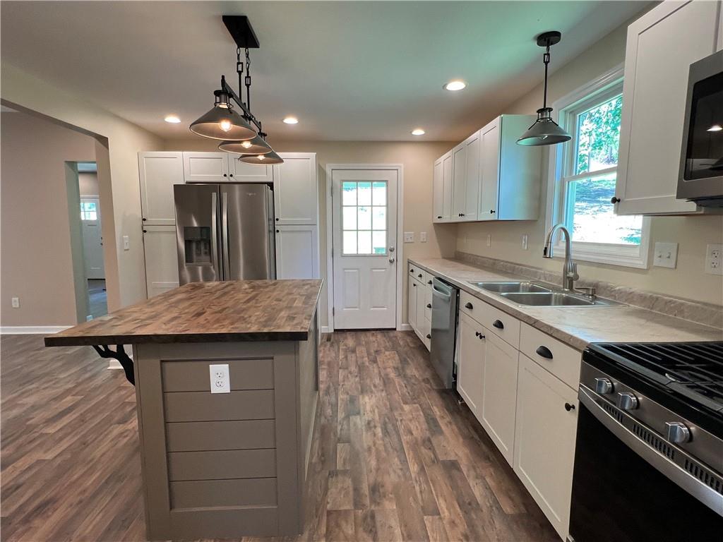 945 McElree Road Washington, PA 15301 - Photo 8 of 16 a kitchen with a stove and a sink