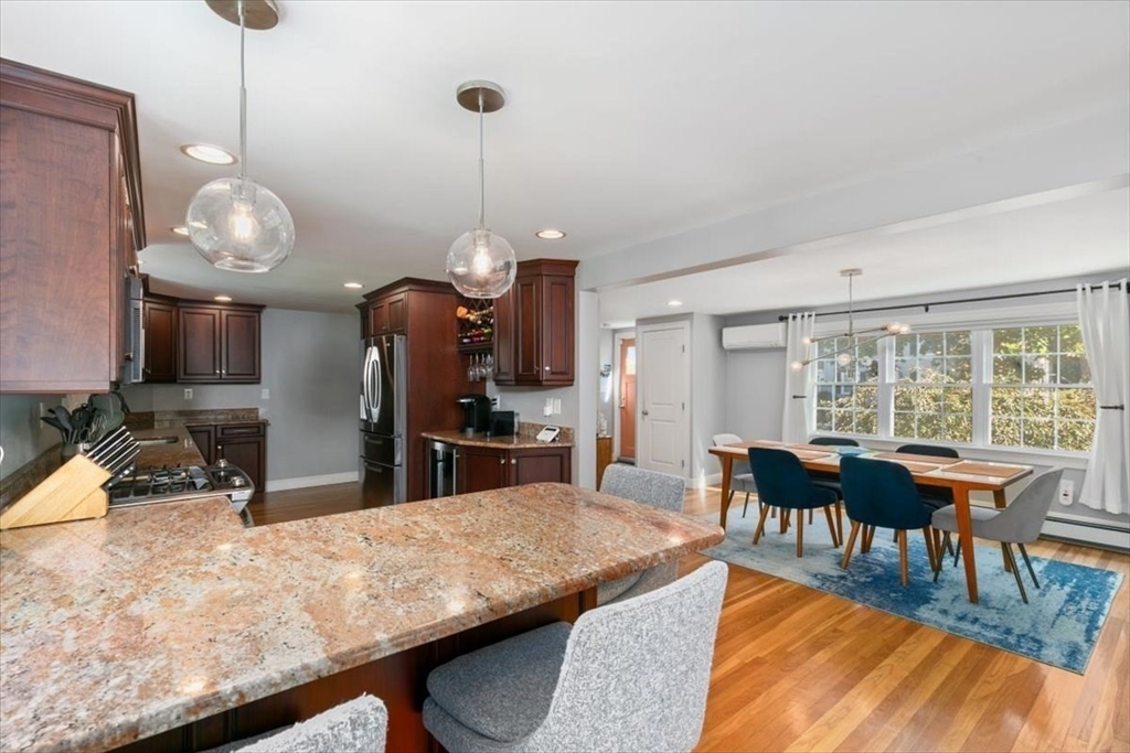 31 Robert Street Wakefield, MA 01880 - Photo 18 of 41 a view of a dining room with furniture window and outside view