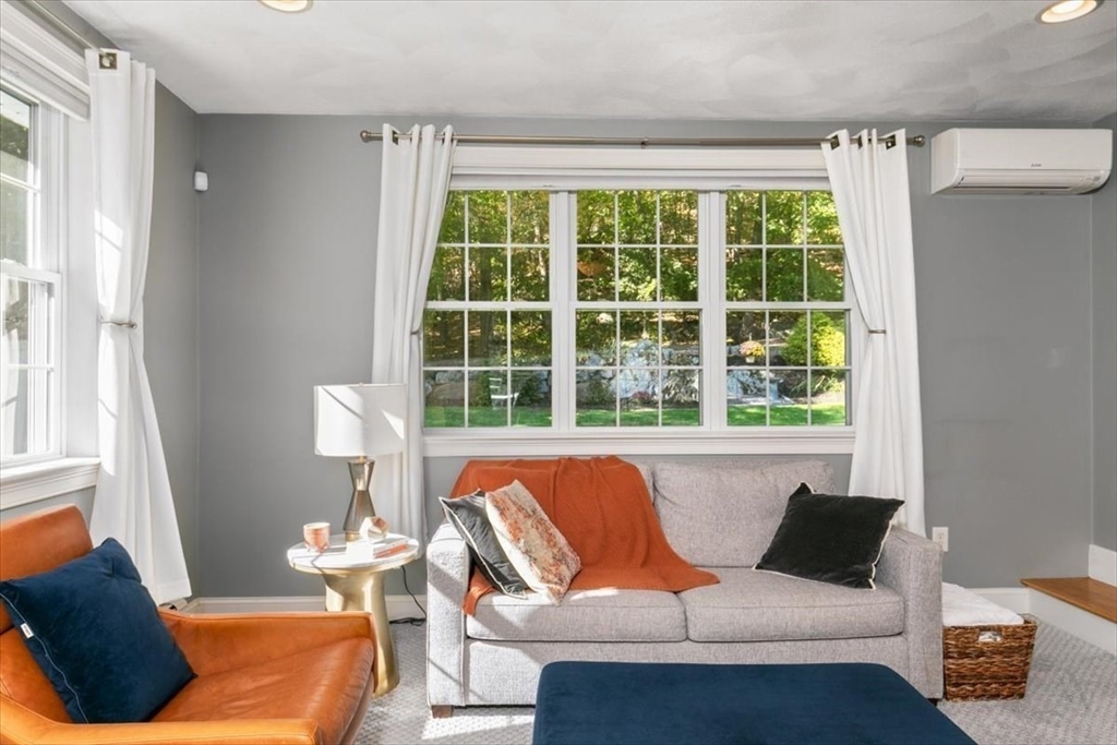 31 Robert Street Wakefield, MA 01880 - Photo 22 of 41 a living room with furniture and a window