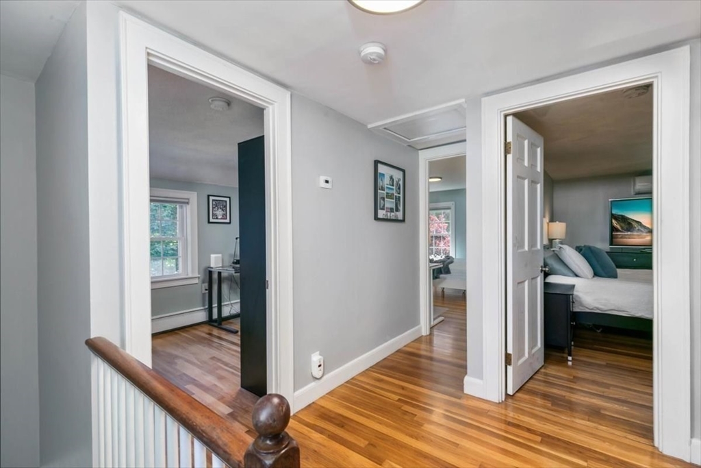 31 Robert Street Wakefield, MA 01880 - Photo 23 of 41 a view of a hallway with a livingroom and dining room