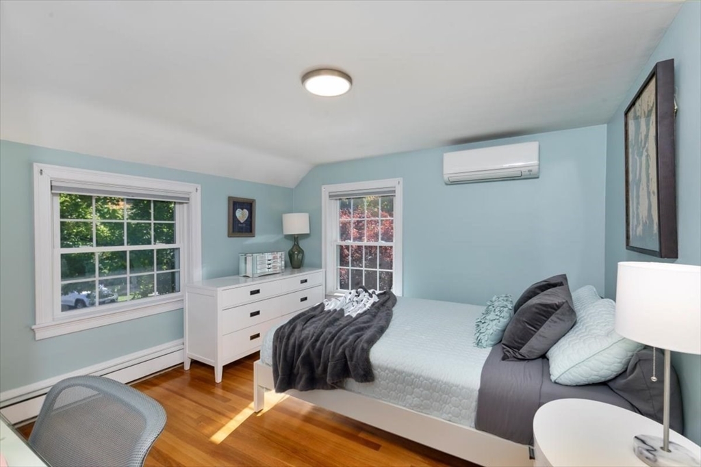 31 Robert Street Wakefield, MA 01880 - Photo 28 of 41 a bedroom with furniture and a window