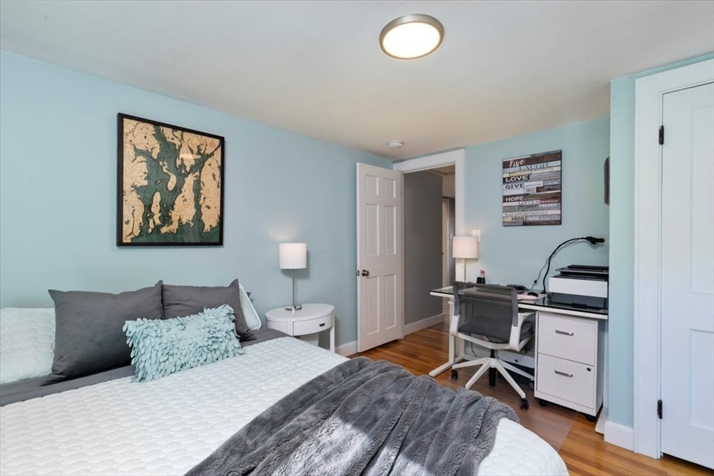 31 Robert Street Wakefield, MA 01880 - Photo 29 of 41 a bedroom with a workspace