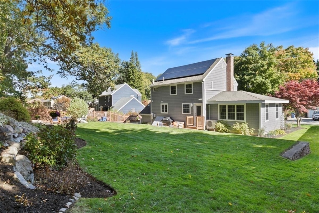 31 Robert Street Wakefield, MA 01880 - Photo 32 of 41 a front view of a house with a garden