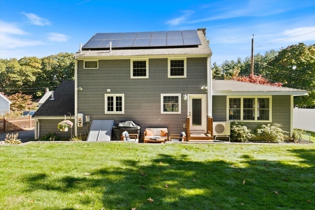 31 Robert Street Wakefield, MA 01880 - Photo 33 of 41 a front view of a house with a yard table and chairs