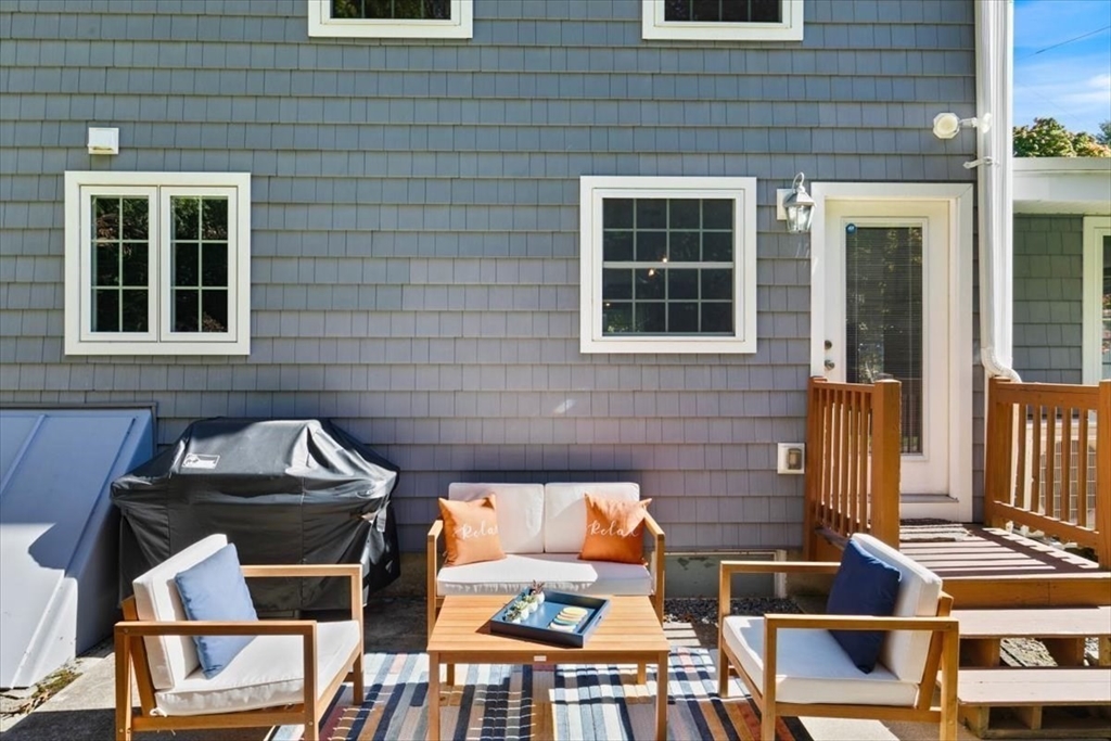 31 Robert Street Wakefield, MA 01880 - Photo 34 of 41 a front view of a house with outdoor seating
