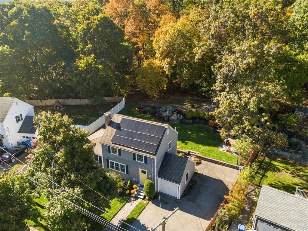 31 Robert Street Wakefield, MA 01880 - Photo 39 of 41 aerial view of a house with a yard