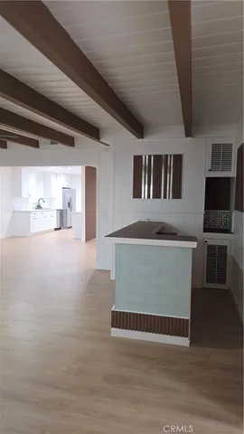 a view of living room kitchen and kitchen
