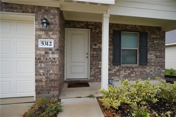 a view of a door of the house