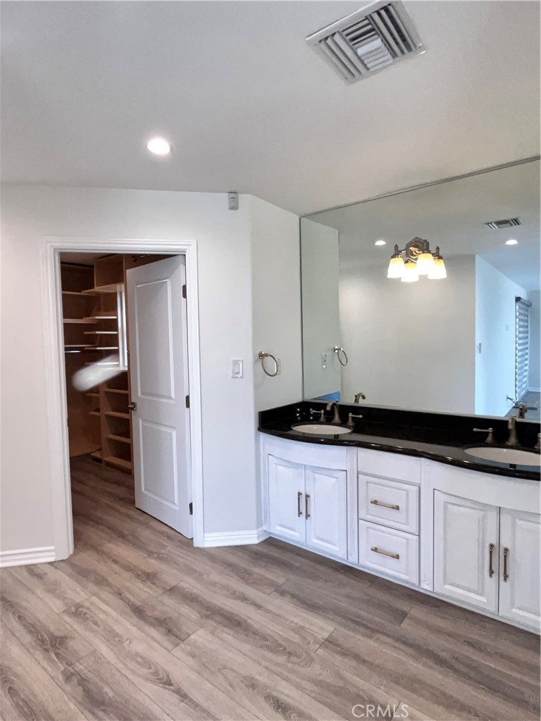881 Harrington Road Glendale, CA 91207 - Photo 27 of 35 a kitchen with granite countertop a sink and cabinets