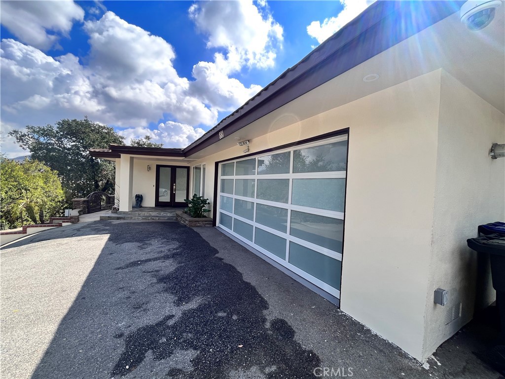 881 Harrington Road Glendale, CA 91207 - Photo 35 of 35 a view of house with a large window and potted plants