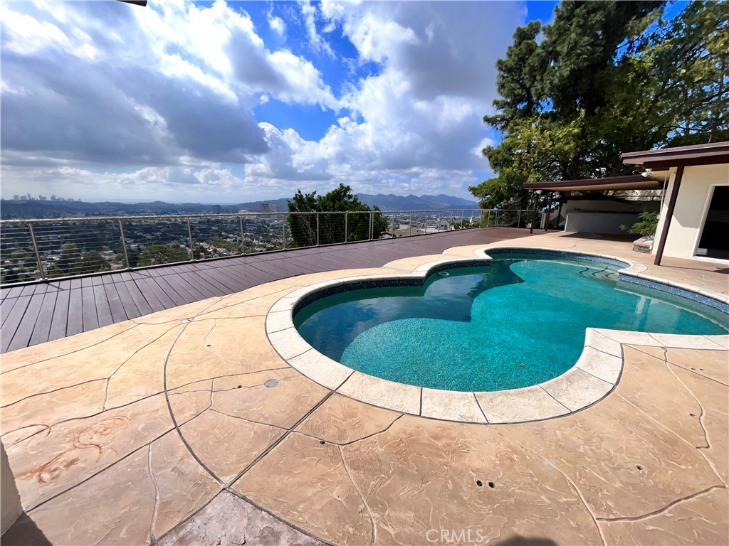 881 Harrington Road Glendale, CA 91207 - Photo 10 of 35 a view of outdoor swimming pool and lake