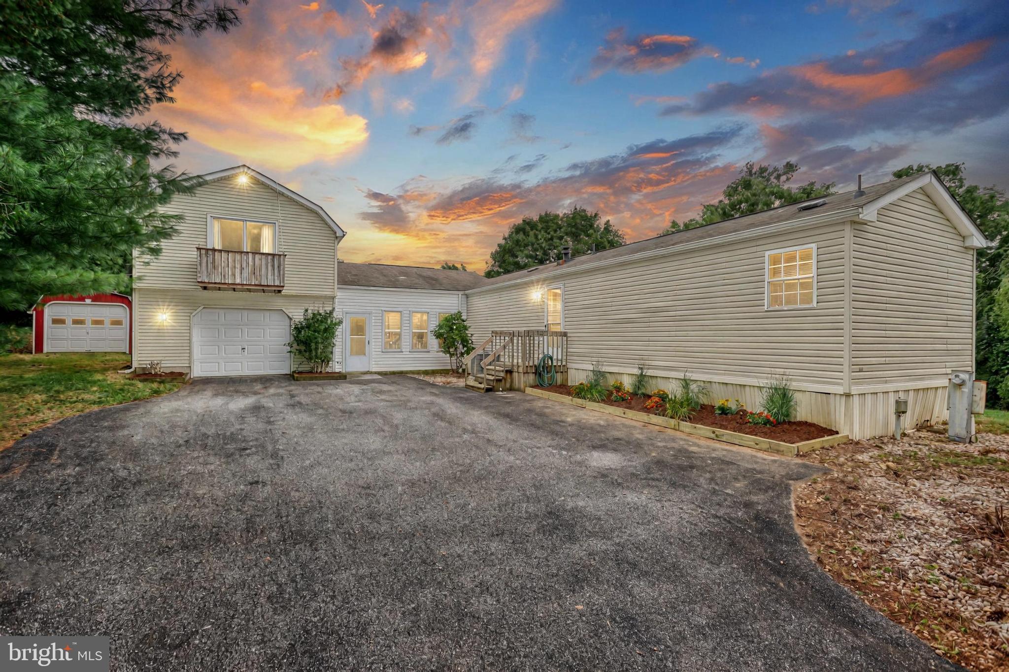 13859 Ebaugh Road Stewartstown, PA 17363 - Photo 2 of 61 a view of a house with backyard and a tree