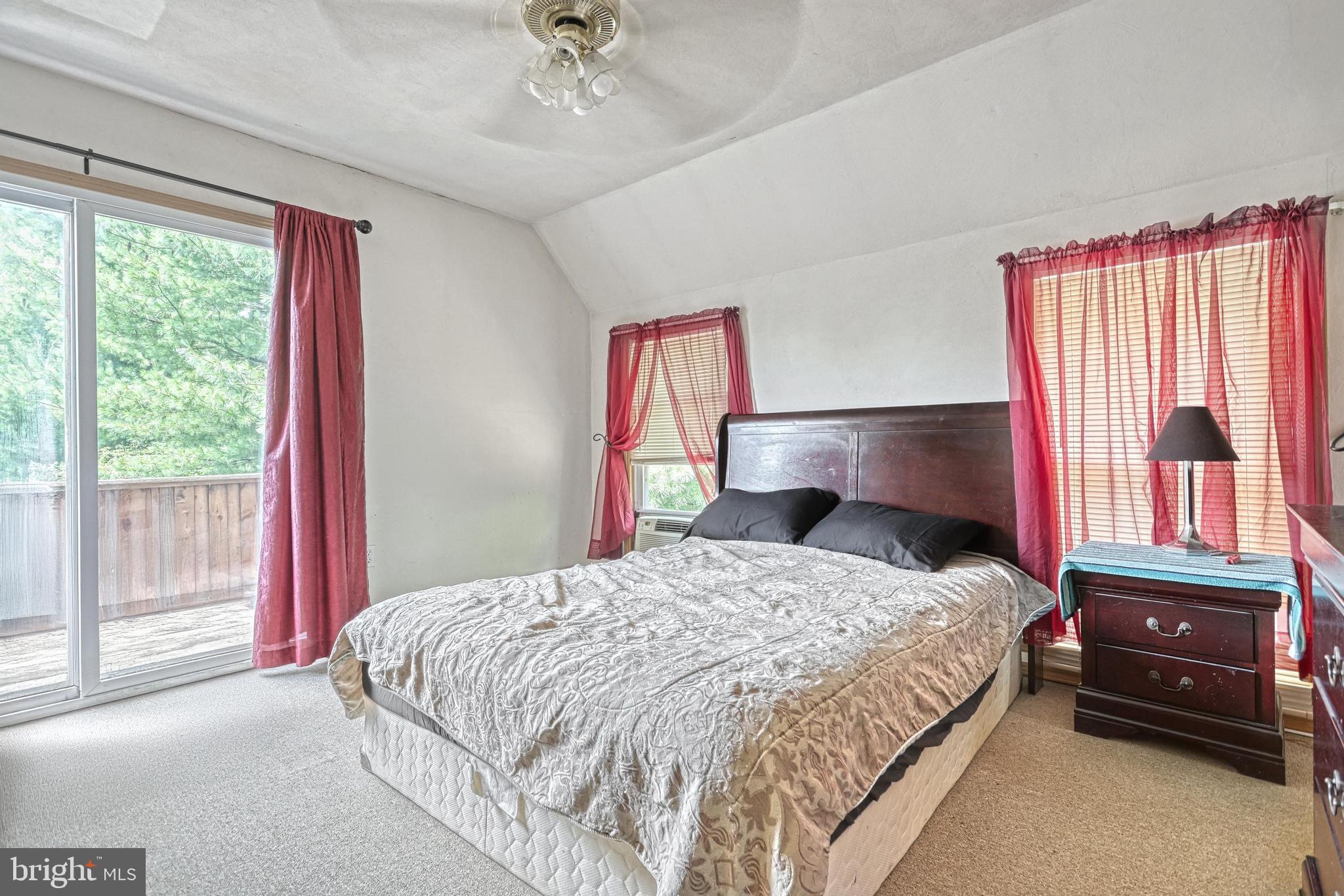 13859 Ebaugh Road Stewartstown, PA 17363 - Photo 24 of 61 a bedroom with a bed and a large window
