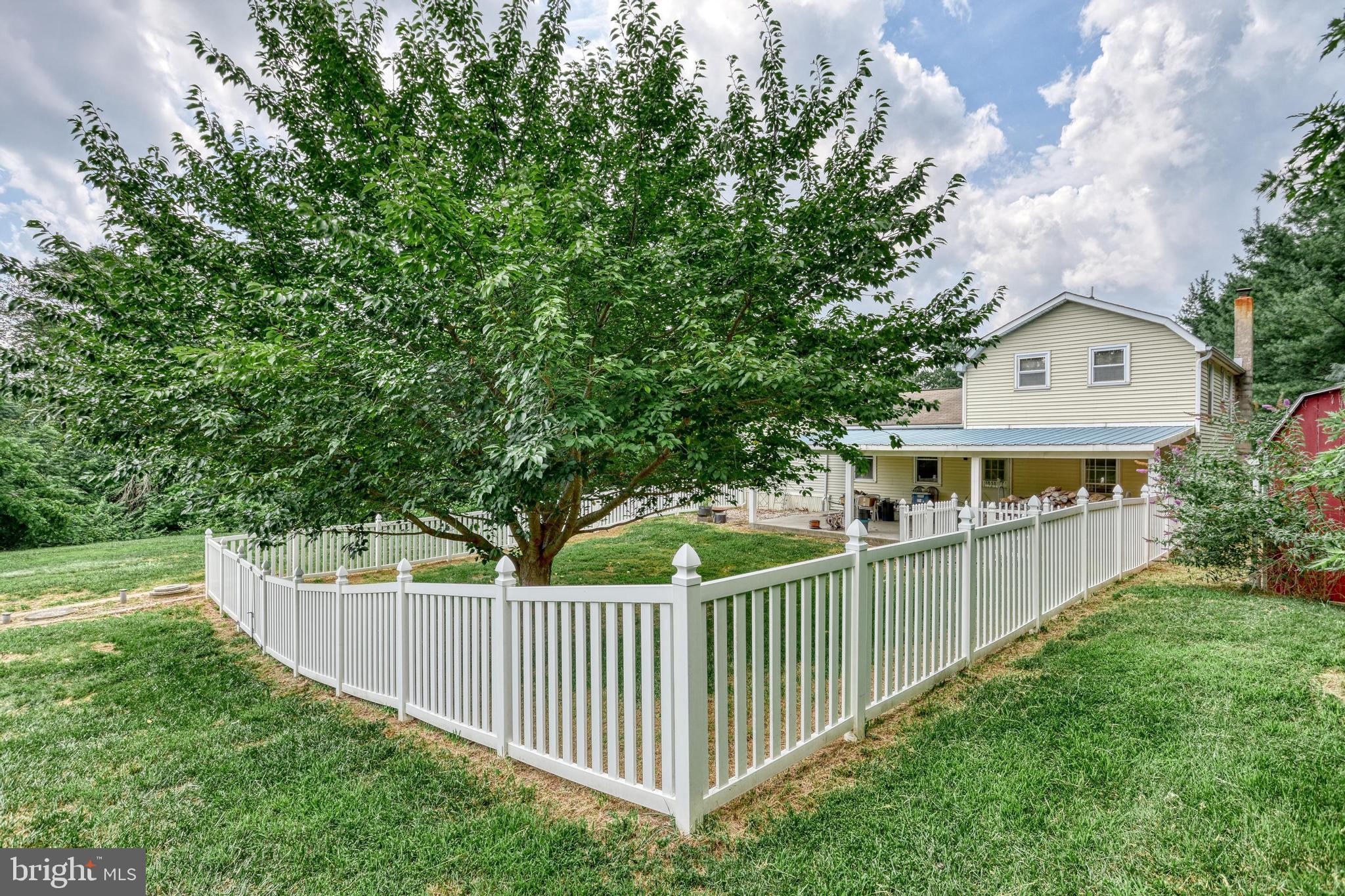 13859 Ebaugh Road Stewartstown, PA 17363 - Photo 29 of 61 a front view of a house with a yard